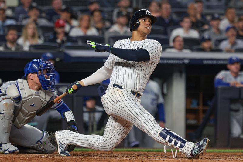 Sep 11, 2024; Bronx, New York, USA; New York Yankees right fielder Juan Soto (22) looks up at his two run home run during the sixth inning against the Kansas City Royals at Yankee Stadium. Mandatory Credit: Vincent Carchietta-Imagn Images