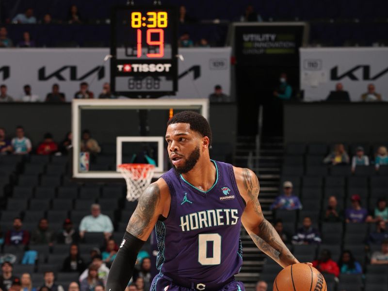 CHARLOTTE, NC - MARCH 5: Miles Bridges #0 of the Charlotte Hornets handles the ball during the game against the Orlando Magic on March 5, 2024 at Spectrum Center in Charlotte, North Carolina. NOTE TO USER: User expressly acknowledges and agrees that, by downloading and or using this photograph, User is consenting to the terms and conditions of the Getty Images License Agreement. Mandatory Copyright Notice: Copyright 2024 NBAE (Photo by Kent Smith/NBAE via Getty Images)