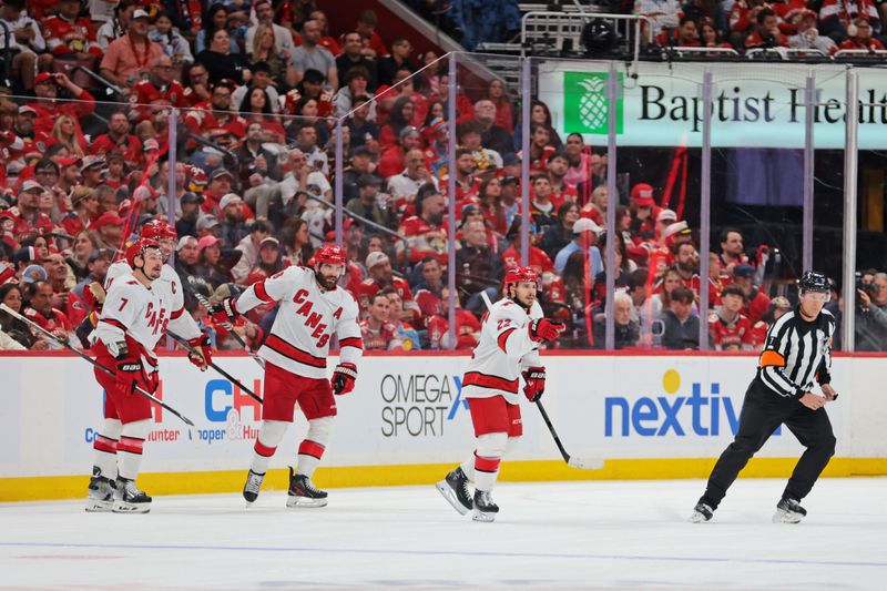 May 26, 2025; Sunrise, Florida, USA; Carolina Hurricanes center Logan Stankoven (22) celebrates after scoring a goal during the second period against the Florida Panthers in game four of the Eastern Conference Final of the 2025 Stanley Cup Playoffs at Amerant Bank Arena. Mandatory Credit: Sam Navarro-Imagn Images