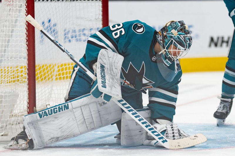 Jan 2, 2024; San Jose, California, USA; San Jose Sharks goaltender Kaapo Kahkonen (36) stops the puck during the third period against the Detroit Red Wings at SAP Center at San Jose. Mandatory Credit: Stan Szeto-USA TODAY Sports