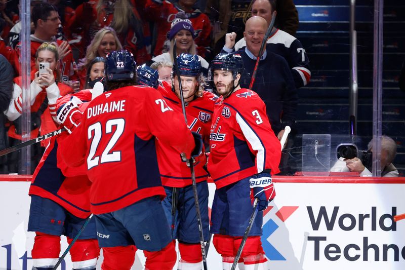 Jan 14, 2025; Washington, District of Columbia, USA; Washington Capitals right wing Brandon Duhaime (22) celebrates with teammates after scoring a goal against the Anaheim Ducks in the first period at Capital One Arena. Mandatory Credit: Geoff Burke-Imagn Images