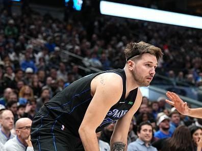 DALLAS, TX - DECEMBER 27: Luka Doncic #77 of the Dallas Mavericks handles the ball during the game against the Cleveland Cavaliers on December 27, 2023 at the American Airlines Center in Dallas, Texas. NOTE TO USER: User expressly acknowledges and agrees that, by downloading and or using this photograph, User is consenting to the terms and conditions of the Getty Images License Agreement. Mandatory Copyright Notice: Copyright 2023 NBAE (Photo by Glenn James/NBAE via Getty Images)