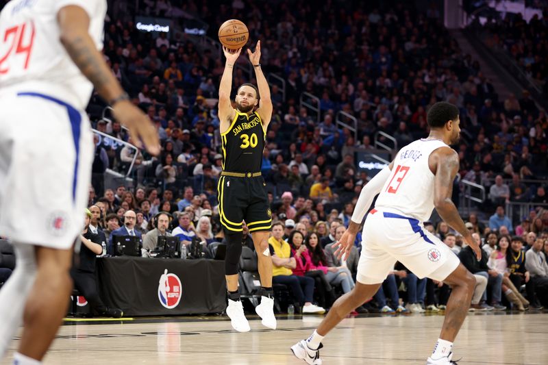 SAN FRANCISCO, CALIFORNIA - FEBRUARY 14: Stephen Curry #30 of the Golden State Warriors shoots the ball against the LA Clippers at Chase Center on February 14, 2024 in San Francisco, California. NOTE TO USER: User expressly acknowledges and agrees that, by downloading and or using this photograph, User is consenting to the terms and conditions of the Getty Images License Agreement.  (Photo by Ezra Shaw/Getty Images)