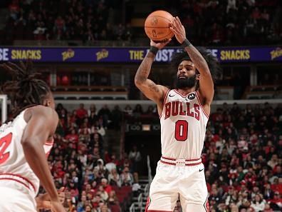 CHICAGO, IL - DECEMBER 23: Coby White #0 of the Chicago Bulls shoots the ball during the game against the Cleveland Cavaliers on December 23, 2023 at United Center in Chicago, Illinois. NOTE TO USER: User expressly acknowledges and agrees that, by downloading and or using this photograph, User is consenting to the terms and conditions of the Getty Images License Agreement. Mandatory Copyright Notice: Copyright 2023 NBAE (Photo by Gary Dineen/NBAE via Getty Images)