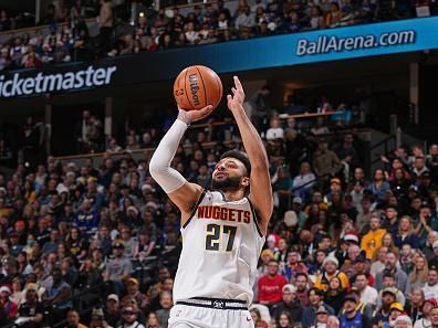 DENVER, CO - DECEMBER 25: Jamal Murray #27 of the Denver Nuggets shoots the ball during the game against the Golden State Warriors on December 25, 2023 at the Ball Arena in Denver, Colorado. NOTE TO USER: User expressly acknowledges and agrees that, by downloading and/or using this Photograph, user is consenting to the terms and conditions of the Getty Images License Agreement. Mandatory Copyright Notice: Copyright 2023 NBAE (Photo by Bart Young/NBAE via Getty Images)