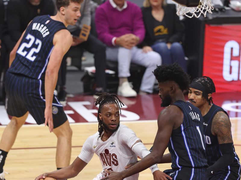 CLEVELAND, OH - APRIL 22: Darius Garland #10 of the Cleveland Cavaliers dribbles the ball during the game against the Orlando Magic during Round 1 Game 2 of the 2024 NBA Playoffs on April 22, 2024 at Rocket Mortgage FieldHouse in Cleveland, Ohio. NOTE TO USER: User expressly acknowledges and agrees that, by downloading and/or using this Photograph, user is consenting to the terms and conditions of the Getty Images License Agreement. Mandatory Copyright Notice: Copyright 2024 NBAE (Photo by Lauren Leigh Bacho/NBAE via Getty Images)