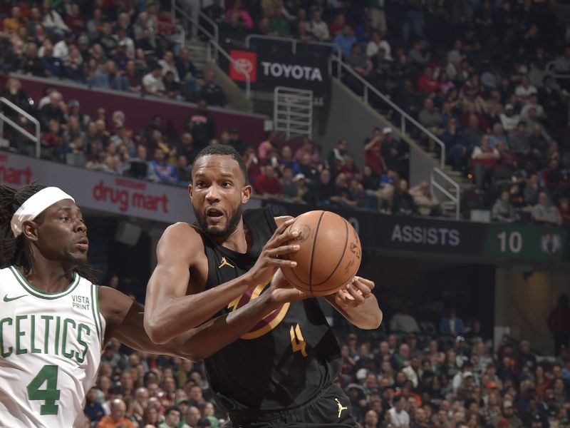 CLEVELAND, OH - MARCH 5: Evan Mobley #4 of the Cleveland Cavaliers drives to the basket during the game against the Boston Celtics on March 5, 2024 at Rocket Mortgage FieldHouse in Cleveland, Ohio. NOTE TO USER: User expressly acknowledges and agrees that, by downloading and/or using this Photograph, user is consenting to the terms and conditions of the Getty Images License Agreement. Mandatory Copyright Notice: Copyright 2024 NBAE (Photo by David Liam Kyle/NBAE via Getty Images)