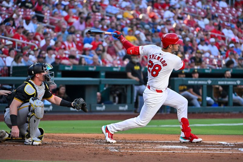 Jun 12, 2024; St. Louis, Missouri, USA;  St. Louis Cardinals third baseman Nolan Arenado (28) hits a single against the Pittsburgh Pirates during the second inning at Busch Stadium. Mandatory Credit: Jeff Curry-USA TODAY Sports