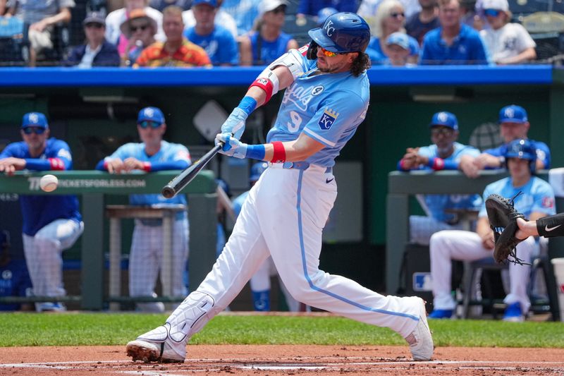 Jun 1, 2025; Kansas City, Missouri, USA; Kansas City Royals first baseman Vinnie Pasquantino (9) singles against the Detroit Tigers during the first inning at Kauffman Stadium. Mandatory Credit: Denny Medley-Imagn Images