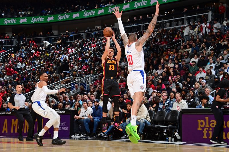 ATLANTA, GA - FEBRUARY 5: Bogdan Bogdanovic #13 of the Atlanta Hawks shoots the ball during the game against the LA Clippers on February 5, 2024 at State Farm Arena in Atlanta, Georgia.  NOTE TO USER: User expressly acknowledges and agrees that, by downloading and/or using this Photograph, user is consenting to the terms and conditions of the Getty Images License Agreement. Mandatory Copyright Notice: Copyright 2024 NBAE (Photo by Scott Cunningham/NBAE via Getty Images)