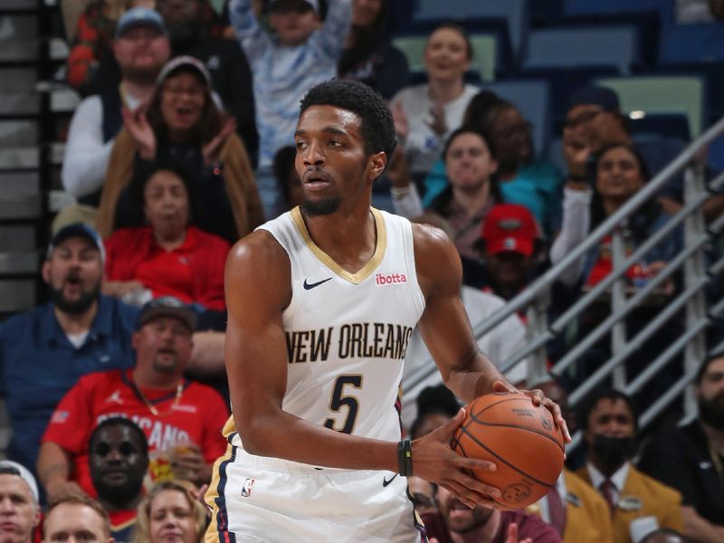 NEW ORLEANS, LA - FEBRUARY 22: Herb Jones #5 of the New Orleans Pelicans handles the ball during the game against the Houston Rockets on February 22, 2024 at the Smoothie King Center in New Orleans, Louisiana. NOTE TO USER: User expressly acknowledges and agrees that, by downloading and or using this Photograph, user is consenting to the terms and conditions of the Getty Images License Agreement. Mandatory Copyright Notice: Copyright 2024 NBAE (Photo by Layne Murdoch Jr./NBAE via Getty Images)