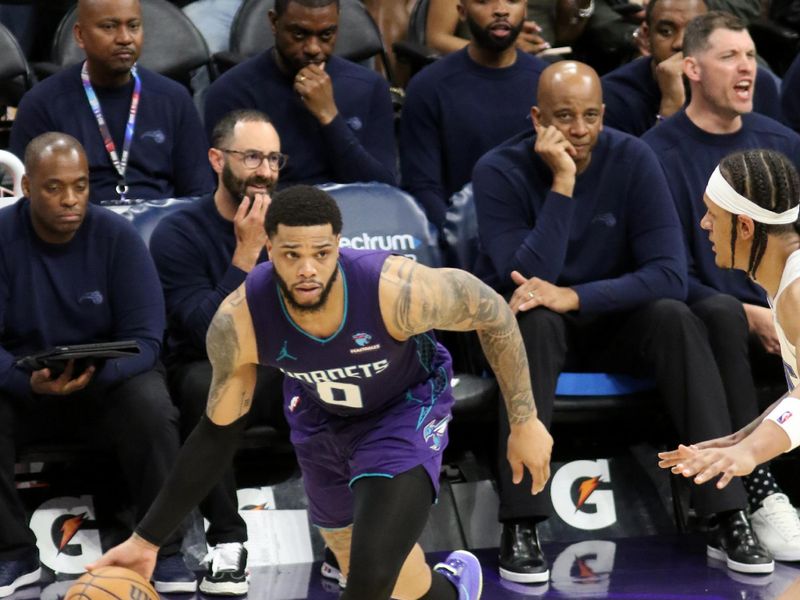 CHARLOTTE, NC - MARCH 5: Miles Bridges #0 of the Charlotte Hornets handles the ball during the game against the Orlando Magic on March 5, 2024 at Spectrum Center in Charlotte, North Carolina. NOTE TO USER: User expressly acknowledges and agrees that, by downloading and or using this photograph, User is consenting to the terms and conditions of the Getty Images License Agreement.  Mandatory Copyright Notice:  Copyright 2024 NBAE (Photo by Brock Williams-Smith/NBAE via Getty Images)