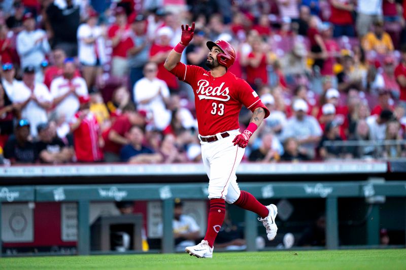 Sep 23, 2023; Cincinnati, Ohio, USA; Cincinnati Reds designated hitter Christian Encarnacion-Strand (33) heads home after hitting a 2-run home run in the first inning against the Pittsburgh Pirates at Great American Ball Park. Mandatory Credit: The Cincinnati Enquirer-USA TODAY Sports