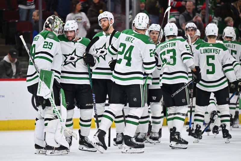 Jan 13, 2024; Chicago, Illinois, USA;  The Dallas Stars celebrate after defeating the Chicago Blackhawks 3-1 at United Center. Mandatory Credit: Jamie Sabau-USA TODAY Sports