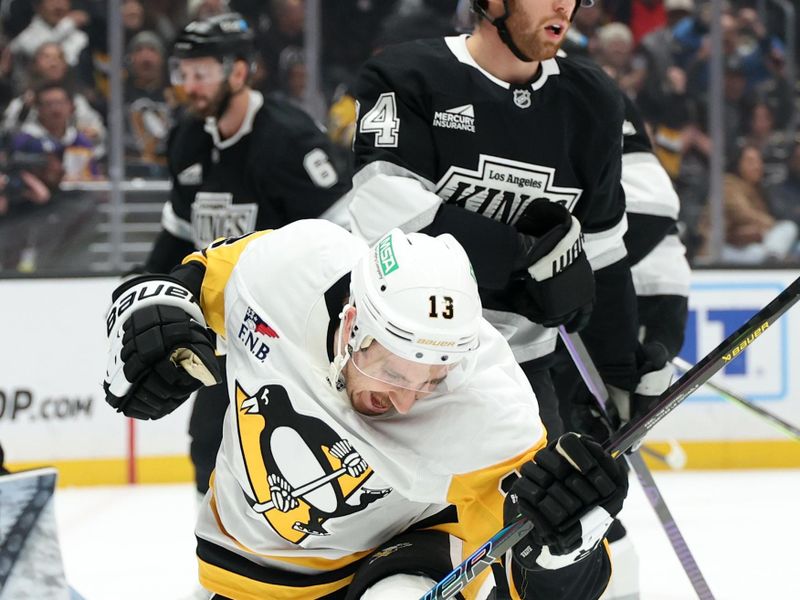 Jan 20, 2025; Los Angeles, California, USA;  Pittsburgh Penguins right wing Kevin Hayes (13) celebrates after scoring a goal during the first period against the Los Angeles Kings at Crypto.com Arena. Mandatory Credit: Kiyoshi Mio-Imagn Images