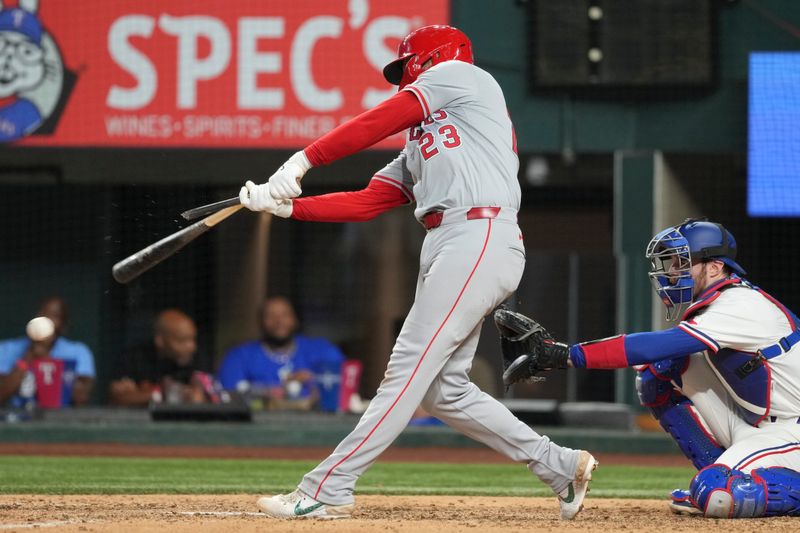 Sep 7, 2024; Arlington, Texas, USA; Los Angeles Angels second baseman Brandon Drury (23) grounds out with a broken bat against the Texas Rangers during the ninth inning at Globe Life Field. Mandatory Credit: Jim Cowsert-Imagn Images