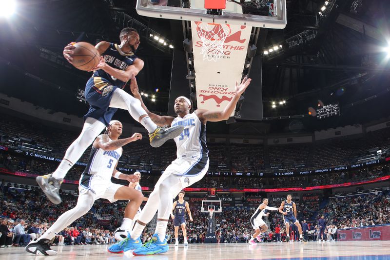 NEW ORLEANS, LA - APRIL 3:  CJ McCollum #3 of the New Orleans Pelicans drives to the basket during the game against the Orlando Magic on April 3, 2024 at the Smoothie King Center in New Orleans, Louisiana. NOTE TO USER: User expressly acknowledges and agrees that, by downloading and or using this Photograph, user is consenting to the terms and conditions of the Getty Images License Agreement. Mandatory Copyright Notice: Copyright 2024 NBAE (Photo by Layne Murdoch Jr./NBAE via Getty Images)