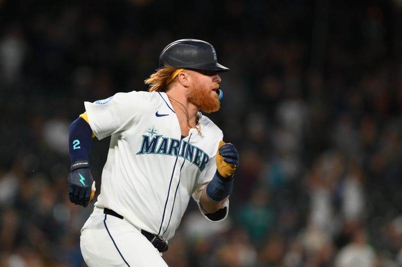 Sep 12, 2024; Seattle, Washington, USA; Seattle Mariners designated hitter Justin Turner (2) runs the bases after hitting a home run against the Texas Rangers during the fourth inning at T-Mobile Park. Mandatory Credit: Steven Bisig-Imagn Images