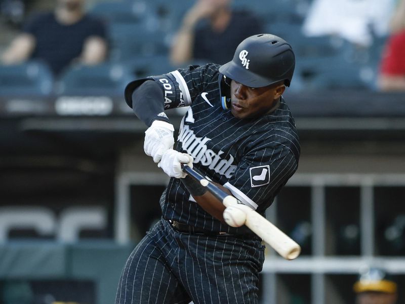 Aug 25, 2023; Chicago, Illinois, USA; Chicago White Sox right fielder Oscar Colas (22) grounds into force out against the Oakland Athletics during the second inning at Guaranteed Rate Field. Mandatory Credit: Kamil Krzaczynski-USA TODAY Sports