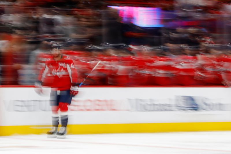 Oct 17, 2024; Washington, District of Columbia, USA; Washington Capitals right wing Tom Wilson (43) celebrates with teammates after scoring a goal against the Dallas Stars in the second period at Capital One Arena. Mandatory Credit: Geoff Burke-Imagn Images