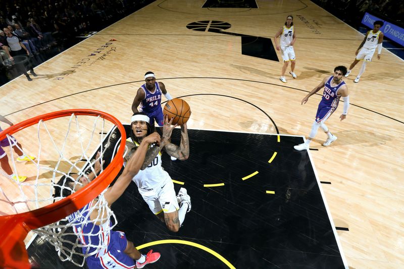 SALT LAKE CITY, UT - FEBRUARY 1: Jordan Clarkson #00 of the Utah Jazz drives to the basket during the game against the Philadelphia 76ers on February 1, 2024 at Delta Center in Salt Lake City, Utah. NOTE TO USER: User expressly acknowledges and agrees that, by downloading and or using this Photograph, User is consenting to the terms and conditions of the Getty Images License Agreement. Mandatory Copyright Notice: Copyright 2024 NBAE (Photo by Melissa Majchrzak/NBAE via Getty Images)