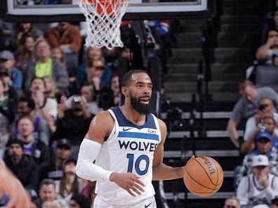 SACRAMENTO, CA - DECEMBER 23: Mike Conley #10 of the Minnesota Timberwolves brings the ball up court against the Sacramento Kings on December 23, 2023 at Golden 1 Center in Sacramento, California. NOTE TO USER: User expressly acknowledges and agrees that, by downloading and or using this Photograph, user is consenting to the terms and conditions of the Getty Images License Agreement. Mandatory Copyright Notice: Copyright 2023 NBAE (Photo by Rocky Widner/NBAE via Getty Images)