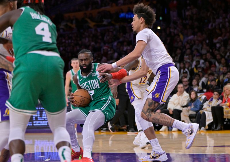 LOS ANGELES, CALIFORNIA - DECEMBER 25: Jaylen Brown #7 of the Boston Celtics drives past Jaxson Hayes #11 of the Los Angeles Lakers in the second half at Crypto.com Arena on December 25, 2023 in Los Angeles, California. NOTE TO USER: User expressly acknowledges and agrees that, by downloading and or using this photograph, User is consenting to the terms and conditions of the Getty Images License Agreement.(Photo by Jayne Kamin-Oncea/Getty Images)