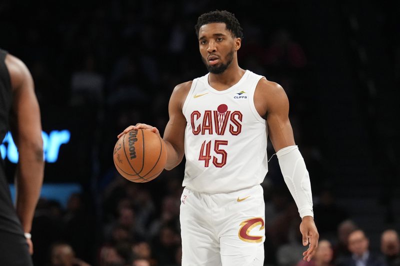 BROOKLYN, NY - FEBRUARY 8: Donovan Mitchell #45 of the Cleveland Cavaliers dribbles the ball during the game against the Brooklyn Nets on February 8, 2024 at Barclays Center in Brooklyn, New York. NOTE TO USER: User expressly acknowledges and agrees that, by downloading and or using this Photograph, user is consenting to the terms and conditions of the Getty Images License Agreement. Mandatory Copyright Notice: Copyright 2024 NBAE (Photo by Jesse D. Garrabrant/NBAE via Getty Images)
