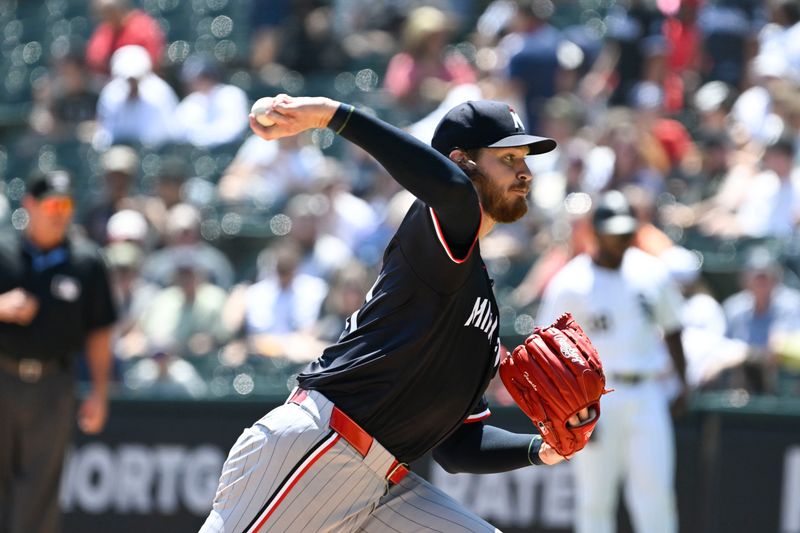 Jul 10, 2024; Chicago, Illinois, USA;  Minnesota Twins pitcher Bailey Ober (17) delivers the ball during the first inning against the Chicago White Sox at Guaranteed Rate Field. Mandatory Credit: Matt Marton-USA TODAY Sports