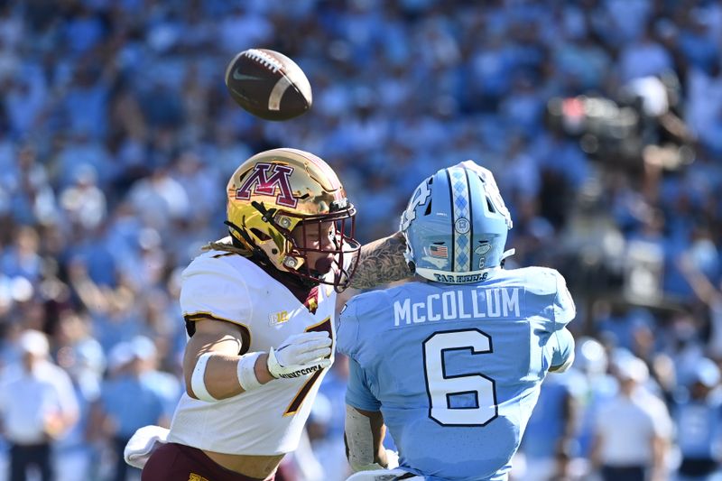 Sep 16, 2023; Chapel Hill, North Carolina, USA; North Carolina Tar Heels wide receiver Nate McCollum (6) catches a touchdown pass as Minnesota Golden Gophers defensive back Aidan Gousby (7) defends in the first quarter at Kenan Memorial Stadium. Mandatory Credit: Bob Donnan-USA TODAY Sports