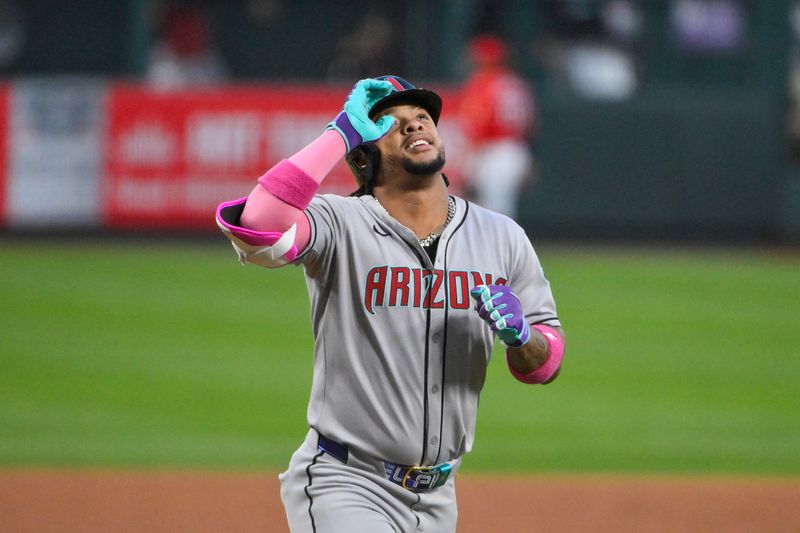 May 23, 2025; St. Louis, Missouri, USA;  Arizona Diamondbacks second baseman Ketel Marte (4) reacts as he runs the bases after hitting a solo home run against the St. Louis Cardinals during the fourth inning at Busch Stadium. Mandatory Credit: Jeff Curry-Imagn Images