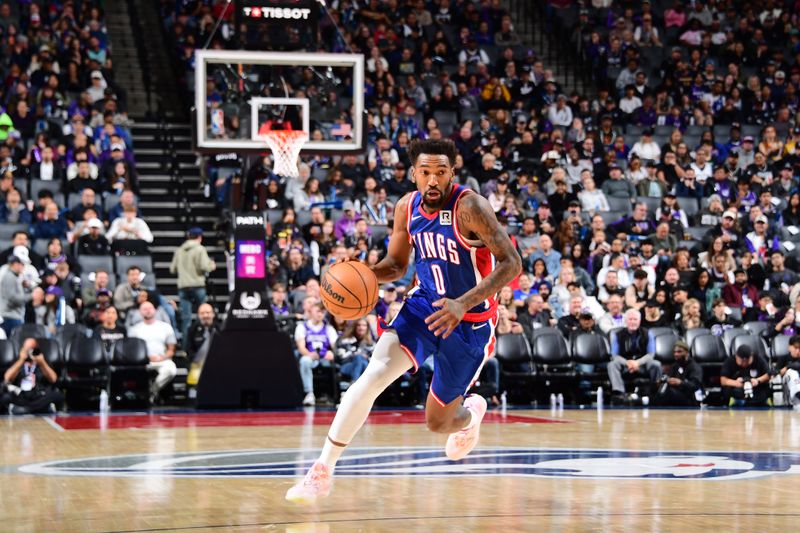 SACRAMENTO, CA - DECEMBER 1: Malik Monk #0 of the Sacramento Kings handles the ball during the game against the San Antonio Spurs on December 1, 2024 at Golden 1 Center in Sacramento, California. NOTE TO USER: User expressly acknowledges and agrees that, by downloading and or using this Photograph, user is consenting to the terms and conditions of the Getty Images License Agreement. Mandatory Copyright Notice: Copyright 2024 NBAE (Photo by Adam Pantozzi/NBAE via Getty Images)