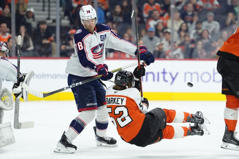 Mar 14, 2026; Philadelphia, Pennsylvania, USA; Columbus Blue Jackets defenseman Damon Severson (78) hits Philadelphia Flyers center Denver Barkley (52) in the second period at Xfinity Mobile Arena. Mandatory Credit: Kyle Ross-Imagn Images