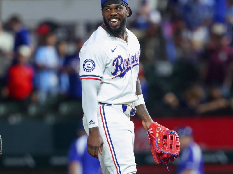 Sep 18, 2024; Arlington, Texas, USA;  Texas Rangers right fielder Adolis Garcia (53) celebrates after the game against the Toronto Blue Jays at Globe Life Field. Mandatory Credit: Kevin Jairaj-Imagn Images