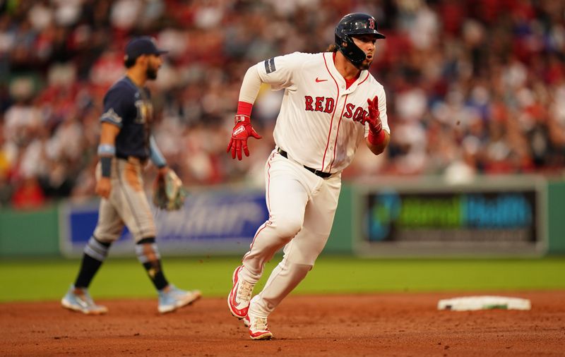 May 13, 2024; Boston, Massachusetts, USA; Boston Red Sox right fielder Wilyer Abreu (52) rounds second base against the Tampa Bay Rays in the first inning at Fenway Park. Mandatory Credit: David Butler II-USA TODAY Sports