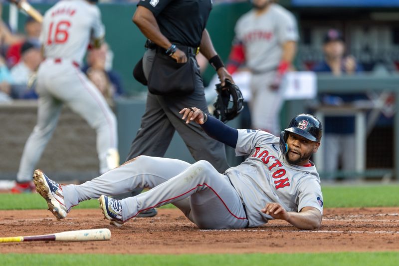 Aug 6, 2024; Kansas City, Missouri, USA;  Boston Red Sox first base Dominic Smith (2) scores during the second inning against the Kansas City Royals at Kauffman Stadium. Mandatory Credit: William Purnell-USA TODAY Sports