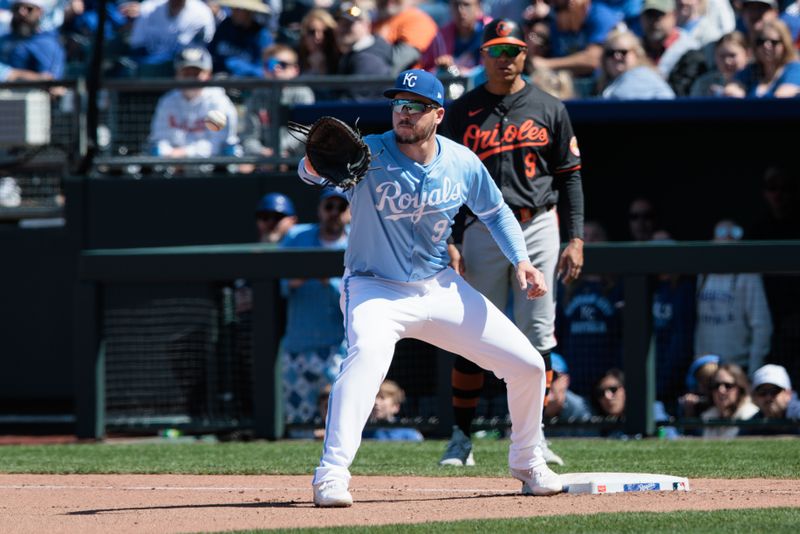 Apr 21, 2024; Kansas City, Missouri, USA; Kansas City Royals first base Vinnie Pasquantino (9) reaches for a throw during the sixth inning against the Baltimore Orioles at Kauffman Stadium. Mandatory Credit: William Purnell-USA TODAY Sports