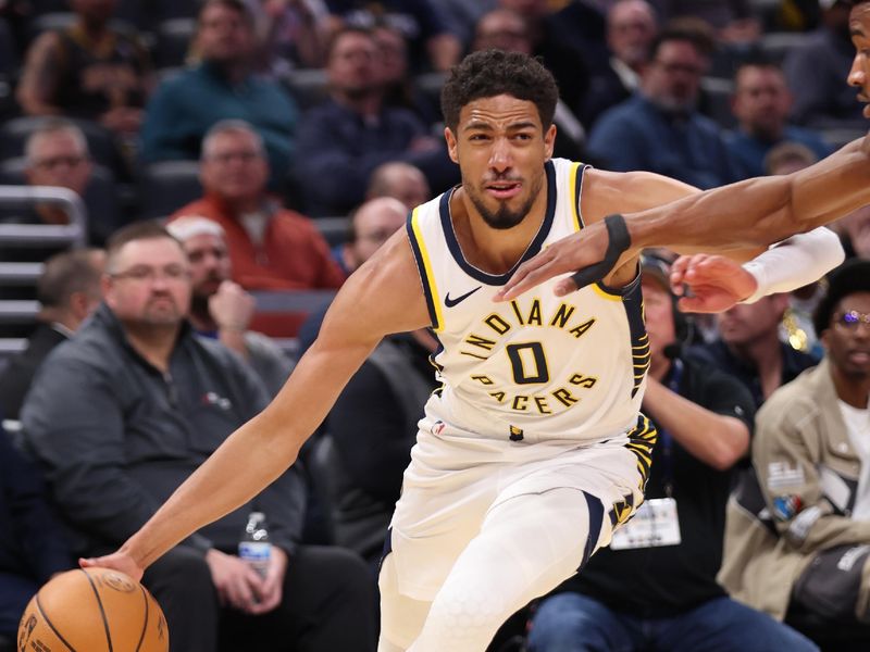 INDIANAPOLIS, IN - FEBRUARY 26:  Tyrese Haliburton #0 of the Indiana Pacers dribbles the ball during the game against the Toronto Raptors on February 26, 2025 at Gainbridge Fieldhouse in Indianapolis, Indiana. NOTE TO USER: User expressly acknowledges and agrees that, by downloading and or using this Photograph, user is consenting to the terms and conditions of the Getty Images License Agreement. Mandatory Copyright Notice: Copyright 2025 NBAE (Photo by Pepper Robinson/NBAE via Getty Images)