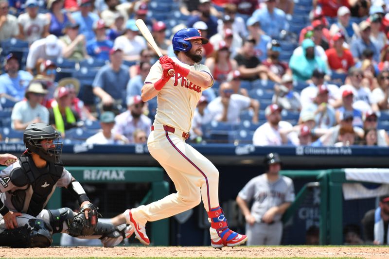 Jun 23, 2024; Philadelphia, Pennsylvania, USA; Philadelphia Phillies outfielder David Dahl (31) hits a two RB single during the sixth inning against the Arizona Diamondbacks at Citizens Bank Park. Mandatory Credit: Eric Hartline-USA TODAY Sports