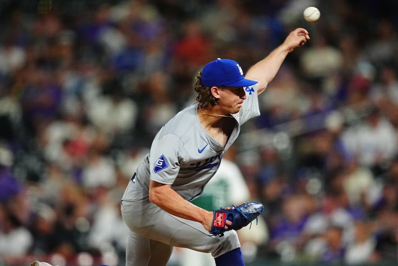 Sep 28, 2024; Denver, Colorado, USA; Los Angeles Dodgers relief pitcher Justin Wrobleski (70) delivers a pitch in the ninth inning against the Colorado Rockies at Coors Field. Mandatory Credit: Ron Chenoy-Imagn Images