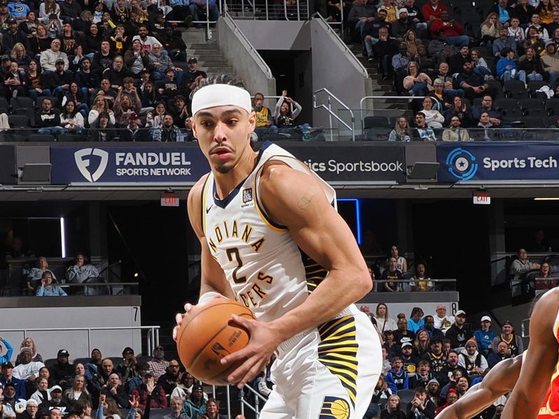 INDIANAPOLIS, IN - FEBRUARY 1: Andrew Nembhard #2 of the Indiana Pacers rebounds the ball during the game against the Atlanta Hawks on February 1, 2025 at Gainbridge Fieldhouse in Indianapolis, Indiana. NOTE TO USER: User expressly acknowledges and agrees that, by downloading and or using this Photograph, user is consenting to the terms and conditions of the Getty Images License Agreement. Mandatory Copyright Notice: Copyright 2025 NBAE (Photo by Ron Hoskins/NBAE via Getty Images)