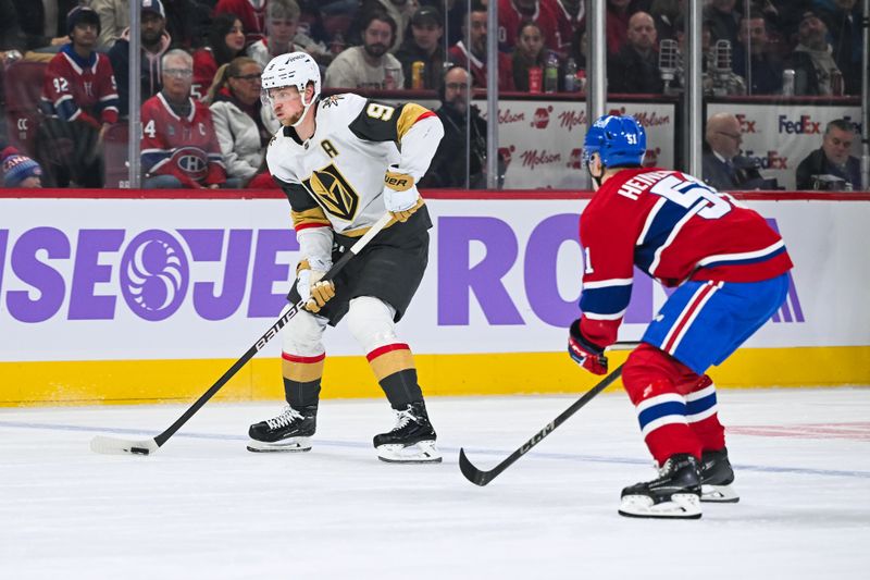 Nov 23, 2024; Montreal, Quebec, CAN; Las Vegas Golden Knights center Jack Eichel (9) plays the puck against Montreal Canadiens left wing Emil Heineman (51) during the first period at Bell Centre. Mandatory Credit: David Kirouac-Imagn Images