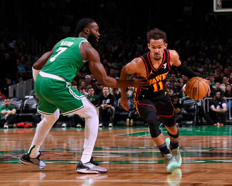 BOSTON, MA - FEBRUARY 7: Trae Young #11 of the Atlanta Hawks dribbles the ball during the game against the Boston Celtics on February 7, 2024 at the TD Garden in Boston, Massachusetts. NOTE TO USER: User expressly acknowledges and agrees that, by downloading and or using this photograph, User is consenting to the terms and conditions of the Getty Images License Agreement. Mandatory Copyright Notice: Copyright 2024 NBAE  (Photo by Brian Babineau/NBAE via Getty Images)