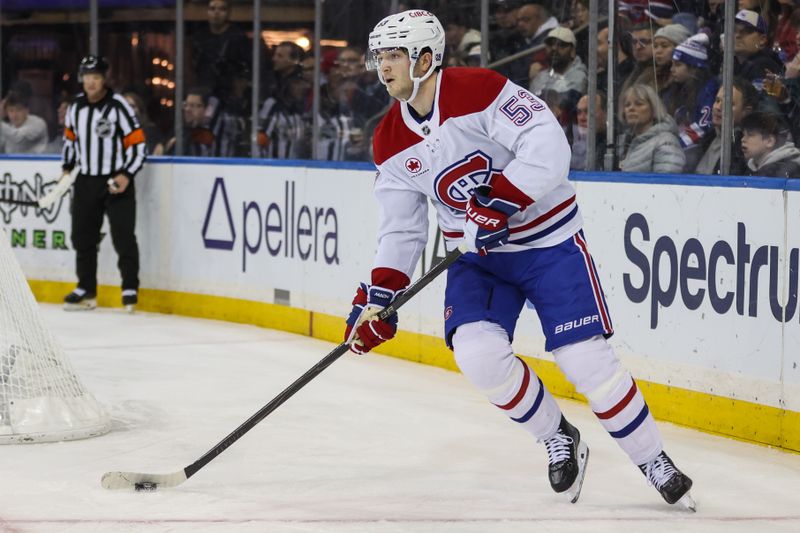 Dec 13, 2025; New York, New York, USA;  Montréal Canadiens defenseman Noah Dobson (53) controls the puck in the second period against the New York Rangers at Madison Square Garden. Mandatory Credit: Wendell Cruz-Imagn Images