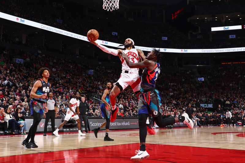 TORONTO, CANADA - MARCH 25: Gary Trent Jr. #33 of the Toronto Raptors drives to the basket during the game against the Brooklyn Nets on March 25, 2024 at the Scotiabank Arena in Toronto, Ontario, Canada.  NOTE TO USER: User expressly acknowledges and agrees that, by downloading and or using this Photograph, user is consenting to the terms and conditions of the Getty Images License Agreement.  Mandatory Copyright Notice: Copyright 2024 NBAE (Photo by Vaughn Ridley/NBAE via Getty Images)