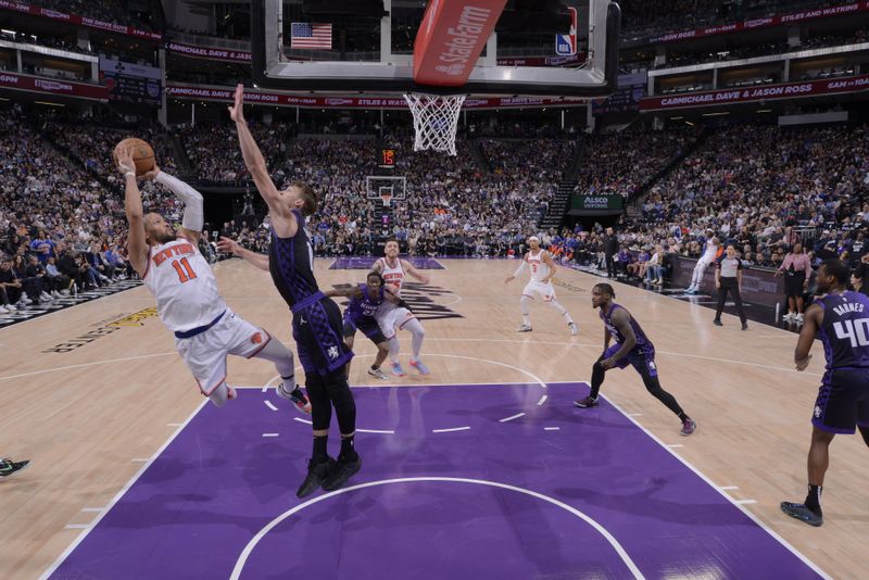 SACRAMENTO, CA - MARCH 16: Jalen Brunson #11 of the New York Knicks drives to the basket during the game against the Sacramento Kings on March 16, 2024 at Golden 1 Center in Sacramento, California. NOTE TO USER: User expressly acknowledges and agrees that, by downloading and or using this Photograph, user is consenting to the terms and conditions of the Getty Images License Agreement. Mandatory Copyright Notice: Copyright 2024 NBAE (Photo by Rocky Widner/NBAE via Getty Images)