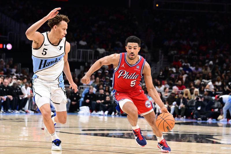 ATLANTA, GA - MARCH 23: Quentin Grimes #5 of the Philadelphia 76ers dribbles the ball during the game against the Atlanta Hawks on March 23, 2025 at State Farm Arena in Atlanta, Georgia.  NOTE TO USER: User expressly acknowledges and agrees that, by downloading and/or using this Photograph, user is consenting to the terms and conditions of the Getty Images License Agreement. Mandatory Copyright Notice: Copyright 2025 NBAE (Photo by Adam Hagy/NBAE via Getty Images)