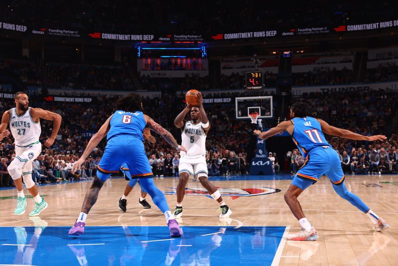 OKLAHOMA CITY, OK - JANUARY 29: Anthony Edwards #5 of the Minnesota Timberwolves handles the ball during the game against the Oklahoma City Thunder on January 29, 2024 at Paycom Arena in Oklahoma City, Oklahoma. NOTE TO USER: User expressly acknowledges and agrees that, by downloading and or using this photograph, User is consenting to the terms and conditions of the Getty Images License Agreement. Mandatory Copyright Notice: Copyright 2024 NBAE (Photo by Zach Beeker/NBAE via Getty Images)