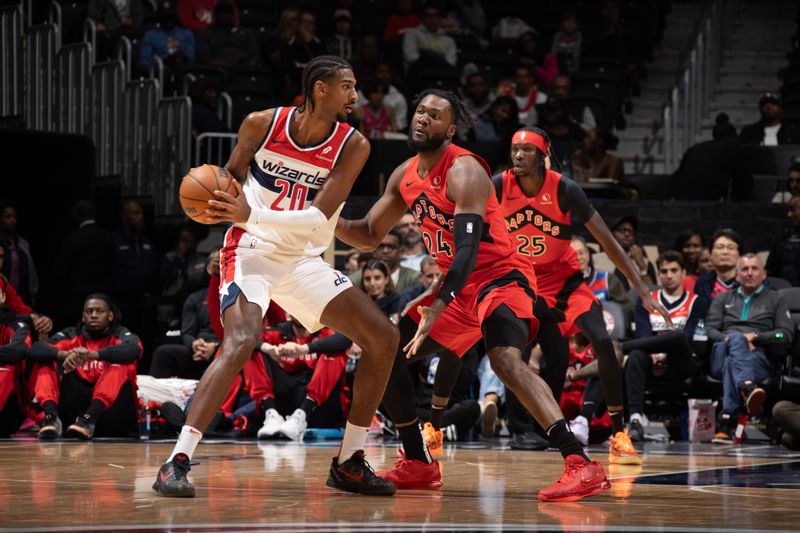 WASHINGTON, DC -? OCTOBER 11: Alexandre Sarr #20 of the Washington Wizards handles the ball during the game against the Toronto Raptors during a NBA preseason game on October 11, 2024 at Capital One Arena in Washington, DC. NOTE TO USER: User expressly acknowledges and agrees that, by downloading and or using this Photograph, user is consenting to the terms and conditions of the Getty Images License Agreement. Mandatory Copyright Notice: Copyright 2024 NBAE (Photo by Stephen Gosling/NBAE via Getty Images)