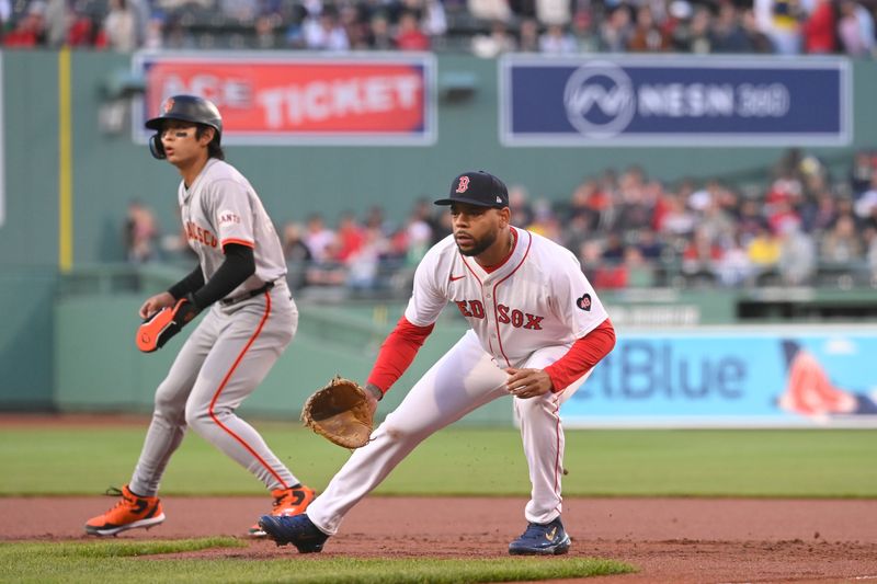 May 1, 2024; Boston, Massachusetts, USA; Boston Red Sox first baseman Dominic Smith (2) makes his Boston Red Sox debut during the first inning against the San Francisco Giants at Fenway Park. Mandatory Credit: Eric Canha-USA TODAY Sports